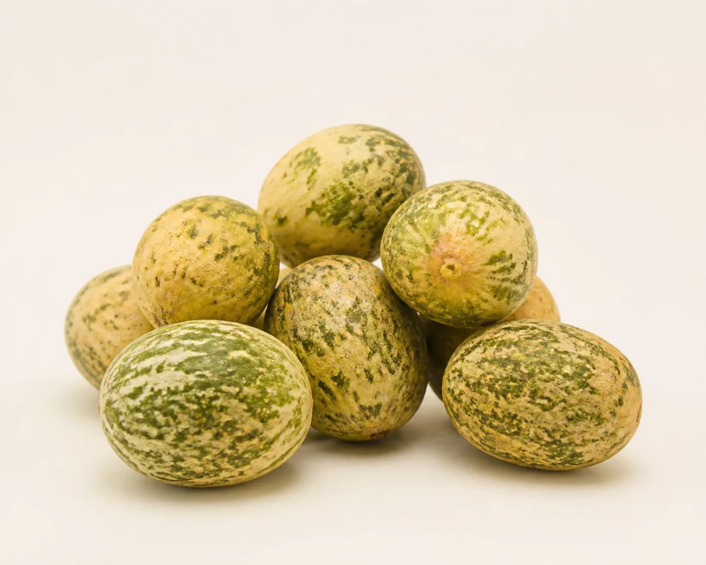 Fresh Kachri arranged on a warm off-white surface.